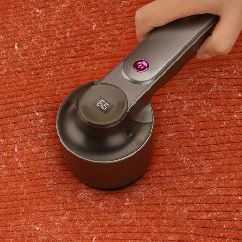 Appareil électrique pour enlever les peluches des vêtements