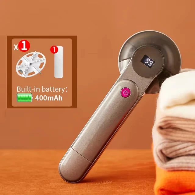 Appareil électrique pour enlever les peluches des vêtements