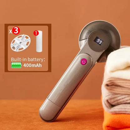 Appareil électrique pour enlever les peluches des vêtements